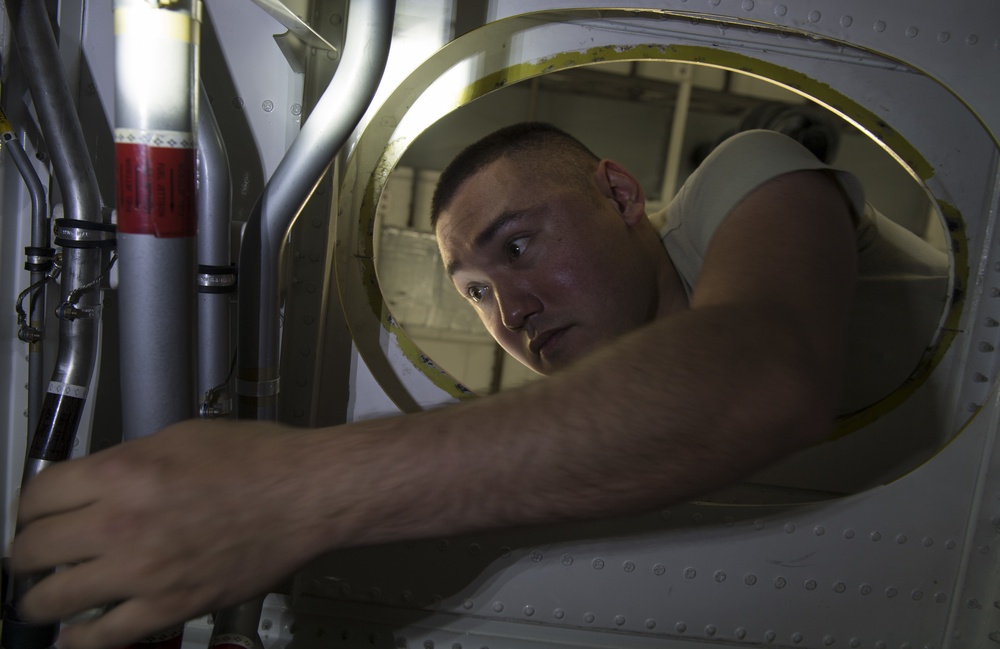 86 MXS crawls into C-130 fuel tank inspection