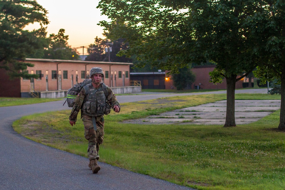 Cpl. Carlo Deldonno marches with his ruck sack