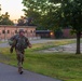Cpl. Carlo Deldonno marches with his ruck sack