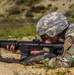 Cpl. Carlo Deldonno shoots a M4 rifle