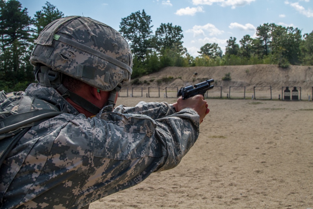 Spc. Wantea Seong fires a M9 pistol