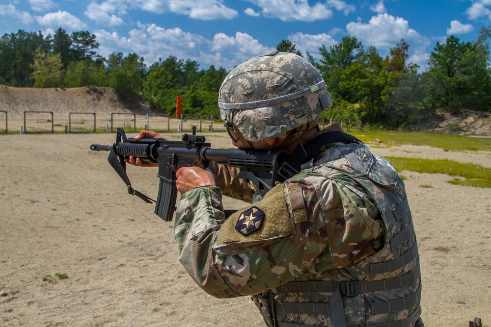 Cpl. Carlo Deldonno fires a M4 rifle