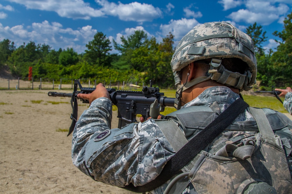 Spc. Kenny Ochoa fires a M4 rifle