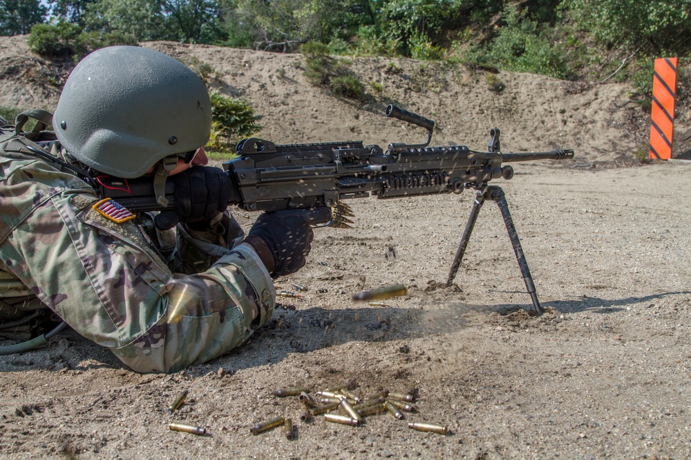 Staff Sgt. Jonathan Anderson qualifies with a M249 squad automatic weapon