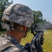 Spc. Kenny Ochoa shoots a M320 grenade launcher