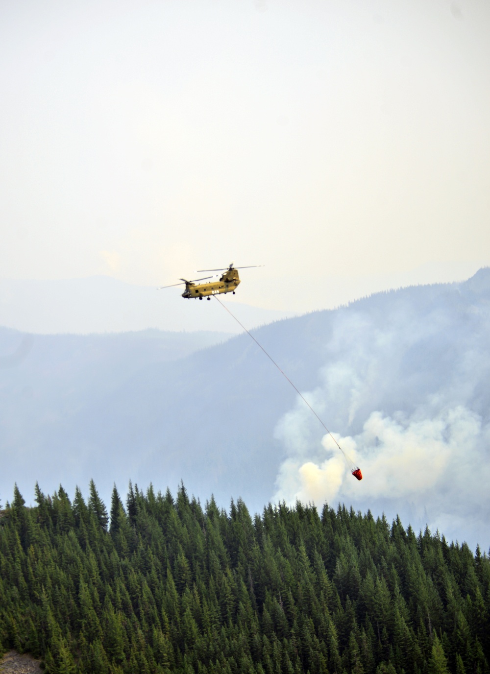 Oregon Army National Guard Soldiers douse Whitewater Fire