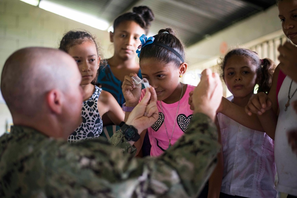 SPS 17 Service Members help Honduran Students during SPS 17 COMREL