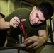 Sailors Repair Engine