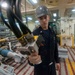 USS America Sailor inspets ordnance hoist