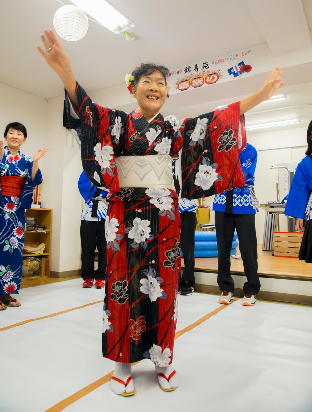 Americans dance with Japanese locals to honor ancestors
