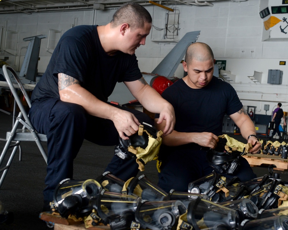 Sailors Inspect Gas Masks