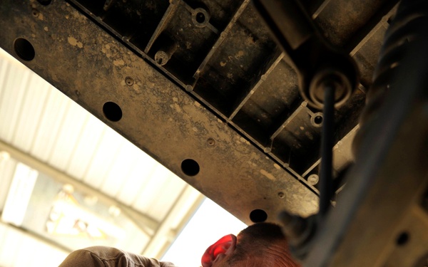 170718-G-DX668-1243 – Coast Guard 305 service member repairs a UTV