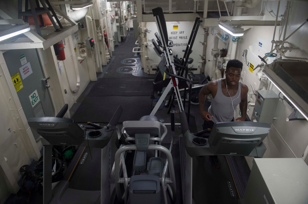 Sailors Conduct PT Aboard USS Sampson