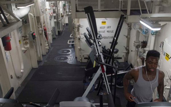 Sailors Conduct PT Aboard USS Sampson