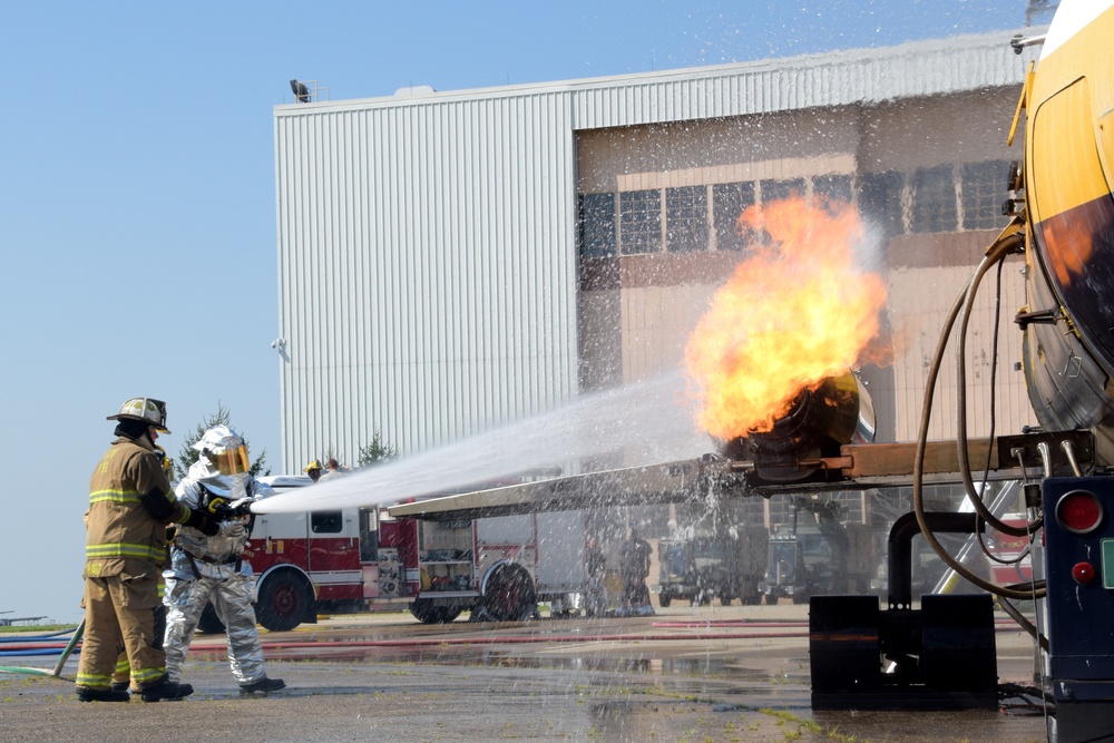 178th Wing fire emergency services members practice putting out burns