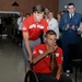 Former Landstuhl Regional Medical Center patients light Invictus Games torch before competition in Canada, thank medical team