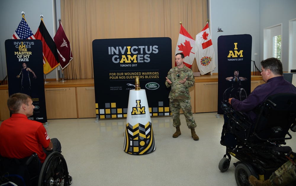 Former Landstuhl Regional Medical Center patients light Invictus Games torch before competition in Canada, thank medical team