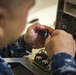 Hospital Corpsman Repairs Honduran Medical Equipment during SPS 17