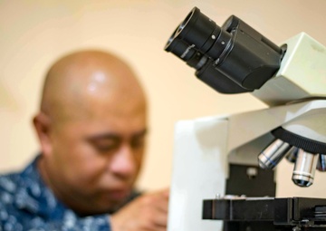 Hospital Corpsman Repairs Honduran Medical Equipment during SPS 17