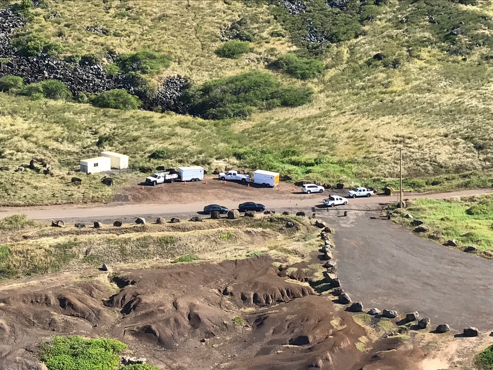 Ground crews at Ka'ena Point search for missing aviators off Oahu