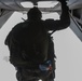 Force Recon Marines perform high altitude-high opening jumps in Yausubetsu