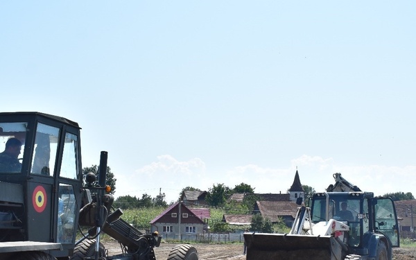 Engineers develop soccer field in Romania
