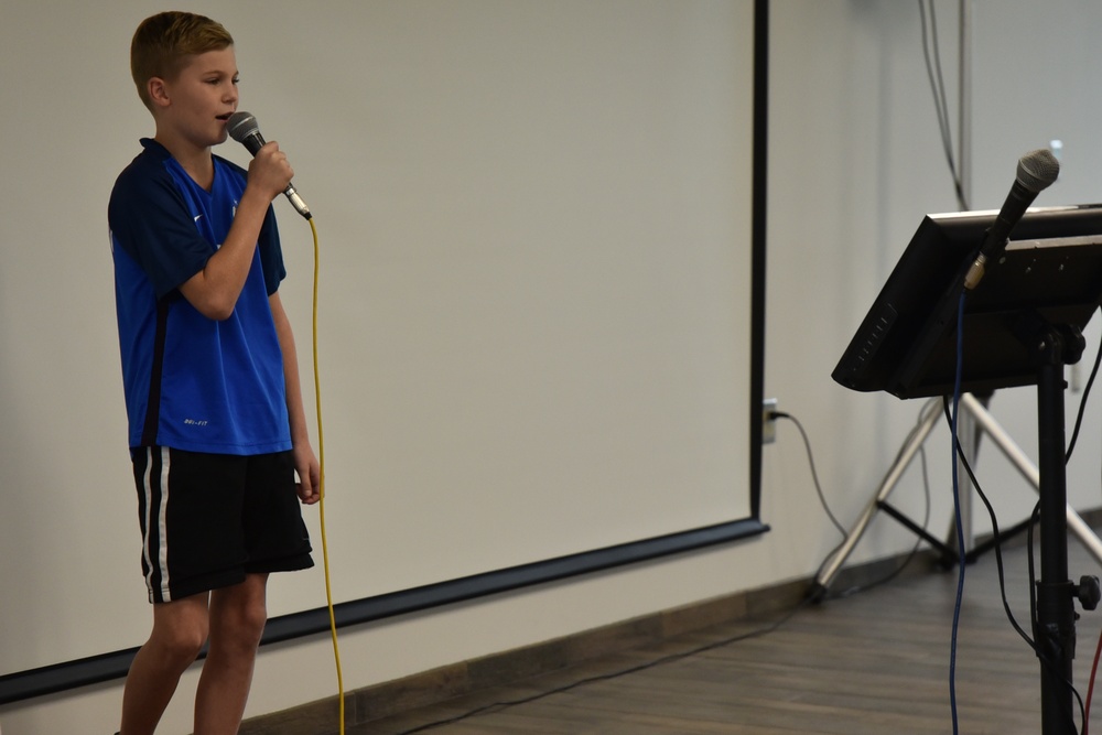 Schriever singers sweep stage