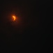 Eclipse appears during overcast skies