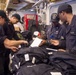 USS America Sailors prepare provisions for USS John S. McCain Sailors