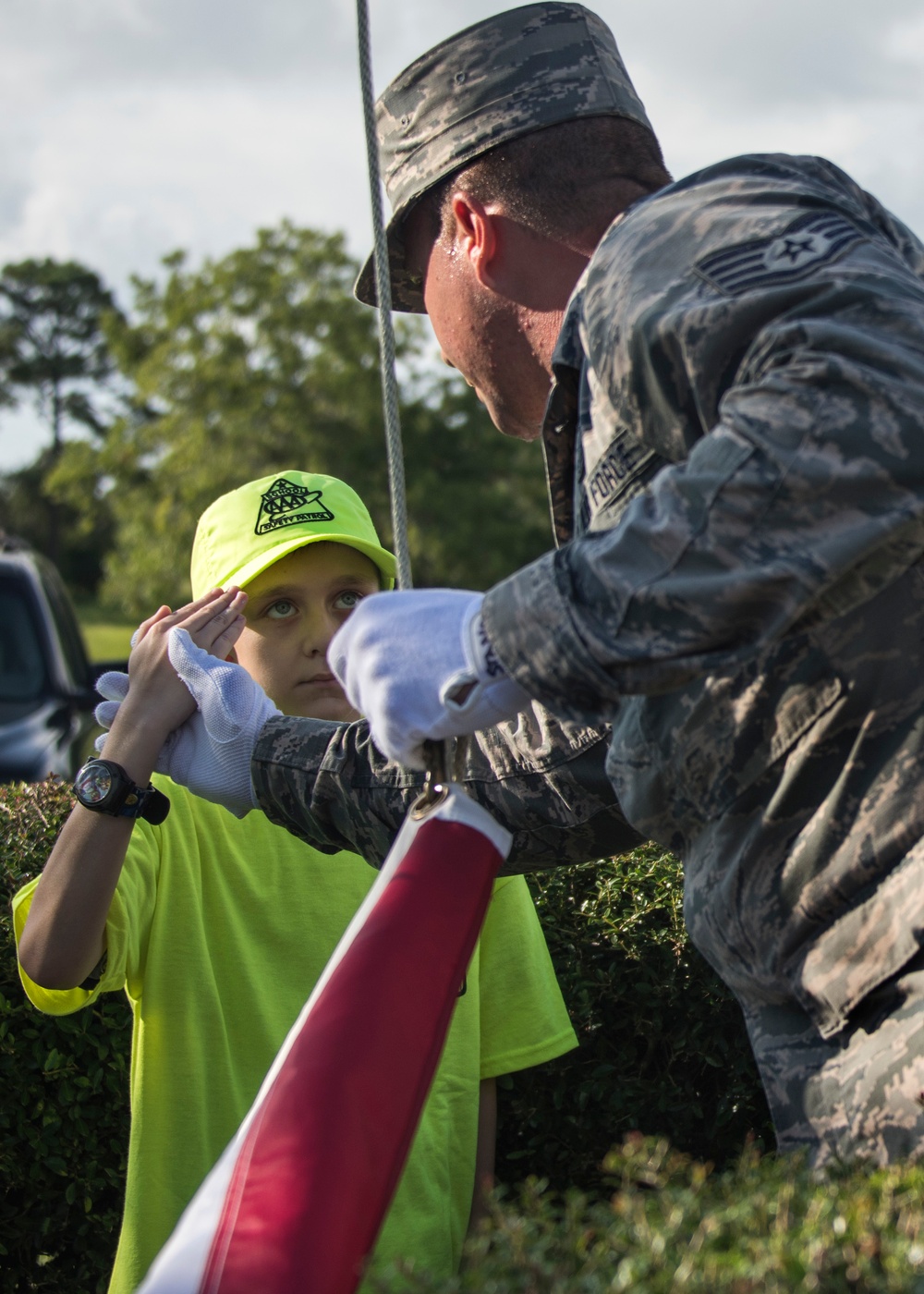 Honor Guard teaches school safety patrol flag etiquette