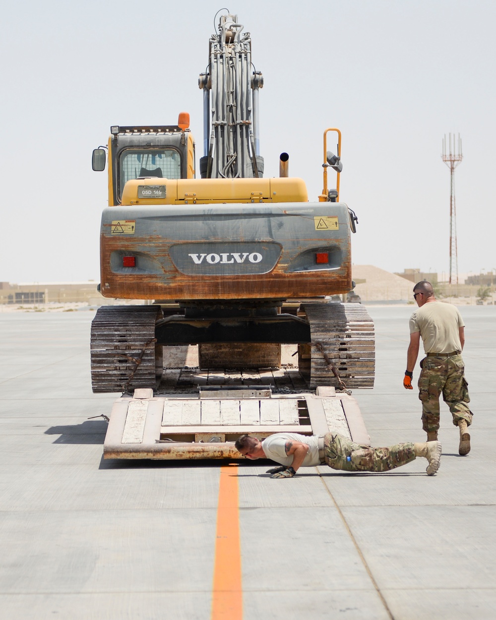 Heavy equipment loaded onto C-17 Globemaster III for transport across the AOR