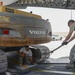 Heavy equipment loaded onto C-17 Globemaster III for transport across the AOR