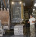 Heavy equipment loaded onto C-17 Globemaster III for transport across the AOR