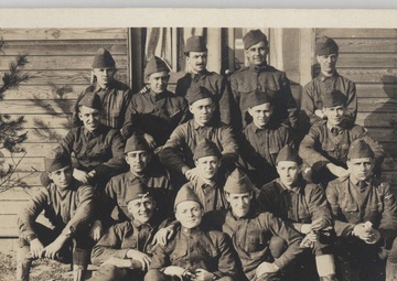 77th Division NCO's pose