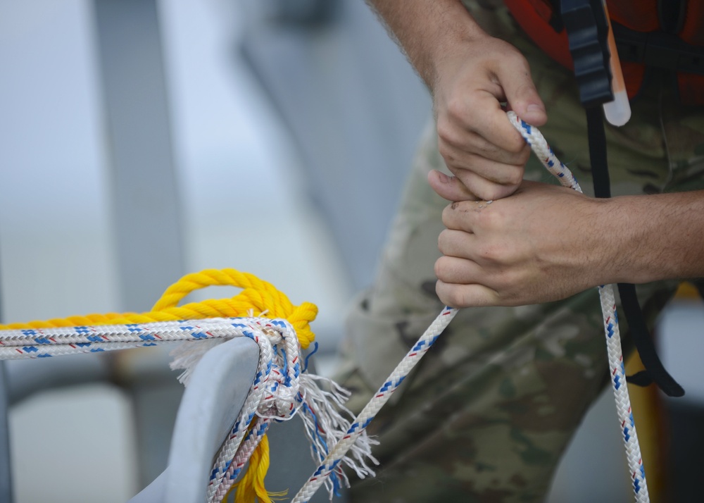 Oh buoy! Soldiers anchor vessel for hurricane season