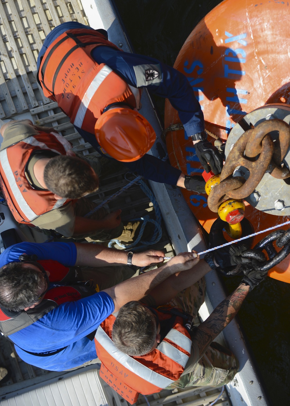 Oh buoy! Soldiers anchor vessel for hurricane season