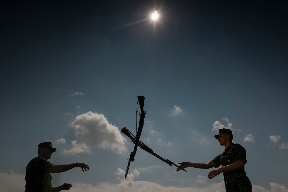 Navy's Ceremonial Guard Trains During Eclipse