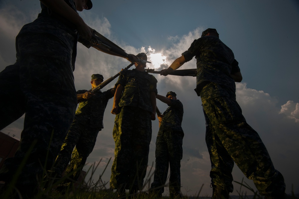 Navy's Ceremonial Guard Trains During Eclipse