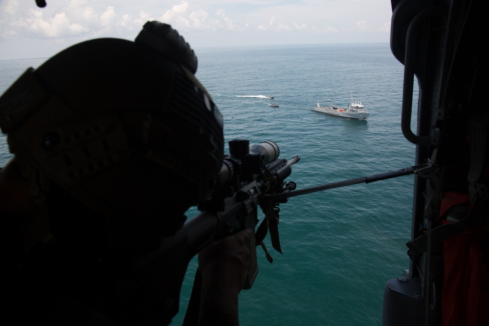 Guardian Angel: MRF provides security from an MH-60S Seahawk