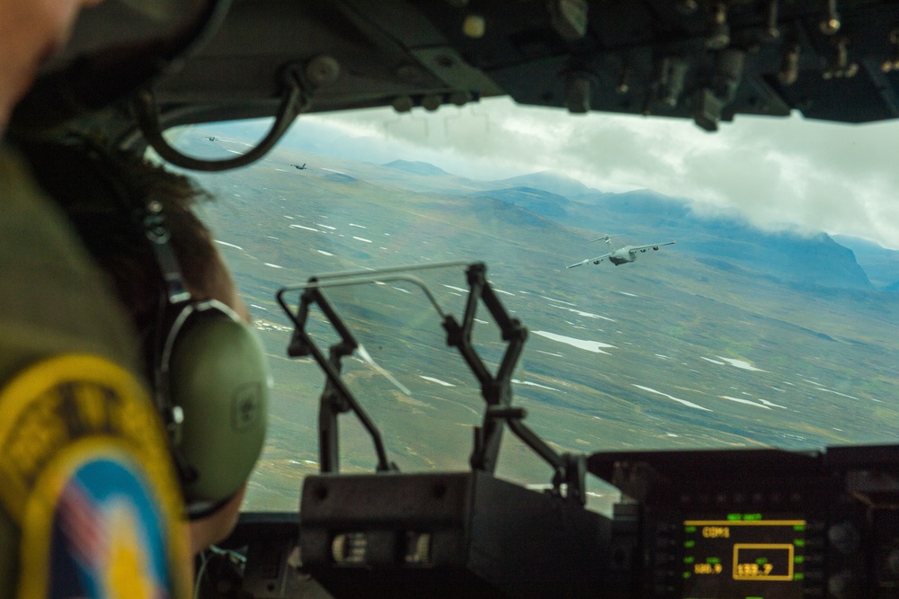 317th AS flies in formation with AK ANG 517 AS