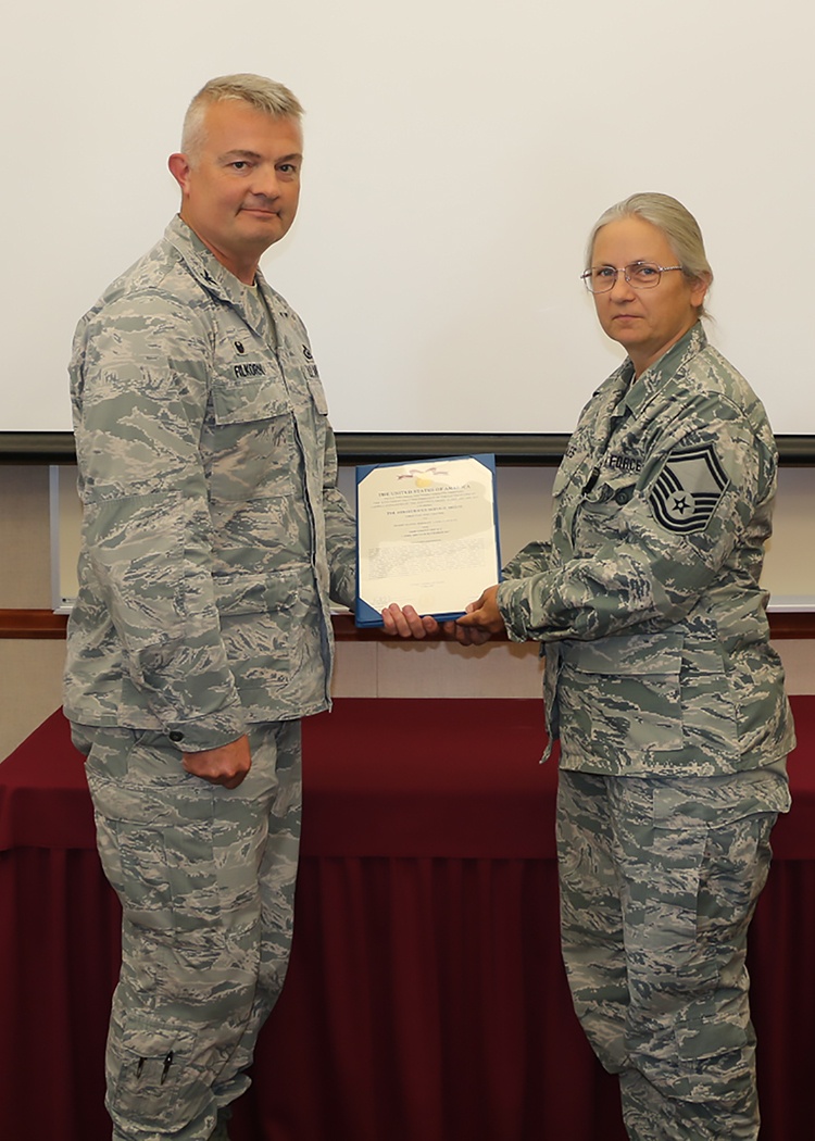 Scales Receives Meritorious Service Medal