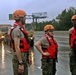 Members of the Texas Army National Guard conduct deep water rescue operations in Houston, Texas