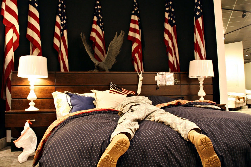 Texas Army National Guard Soldiers rest in a Gallery Furniture store, in Katy, Texas