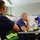 The Coast Guard's incident command post members meet