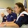 The Coast Guard's incident command post members meet