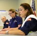 The Coast Guard's incident command post members meet