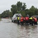 A Coast Guard Flood Punt Team conducts rescue operations