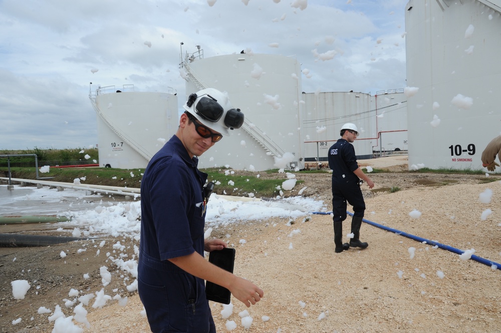 Coast Guard Personnel assess oil refineries in Houston