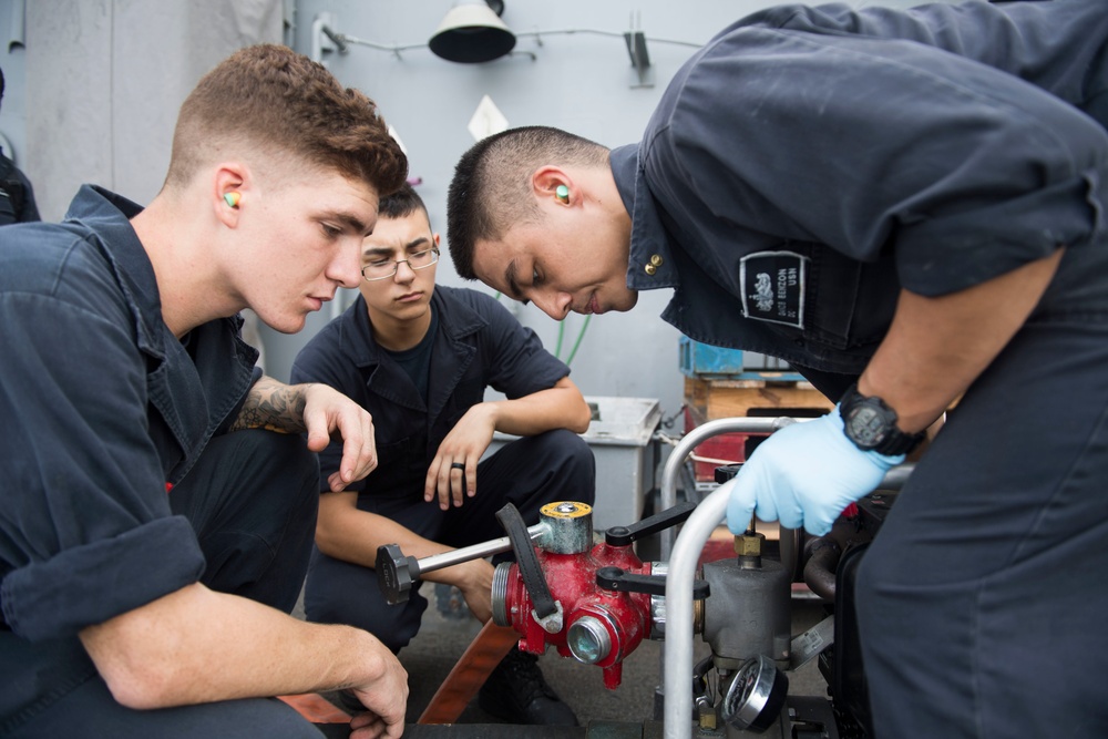 USS Lake Erie (CG 70) maintain a P-100 fire pump