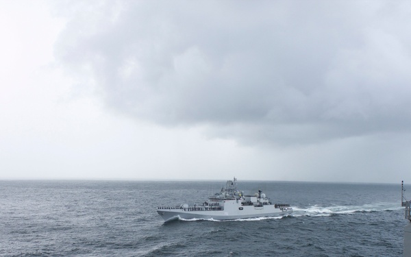 USS Pearl Harbor manuevers with the INS Trikand during live-fire gunnery exercise